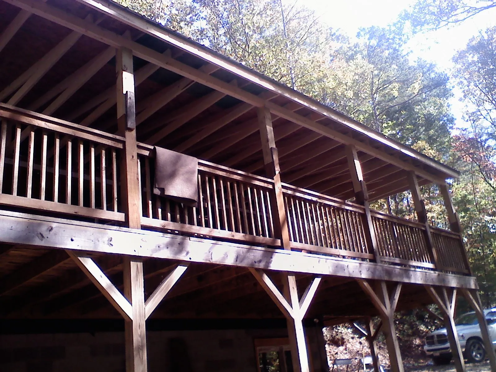 Timber framing under a new elevated porch and deck — Roof Leak Repair in Lake Odessa by Roofing Brothers